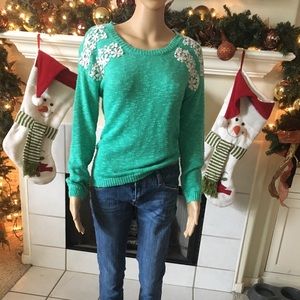 Teal sweater with white flowers